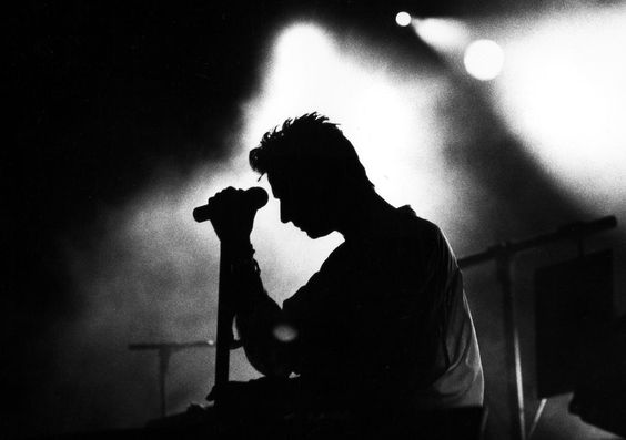 Depeche Mode performing live at Pasadena Rose Bowl, June 1988.